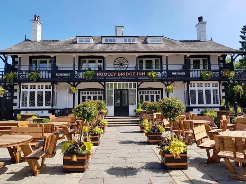 The beautiful exterior of the Pooley Bridge Inn, a dog-friendly pub in the Lake District