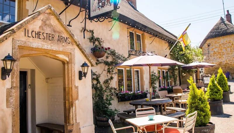The exterior of the Ilchester Arms, a dog-friendly pub in Dorset