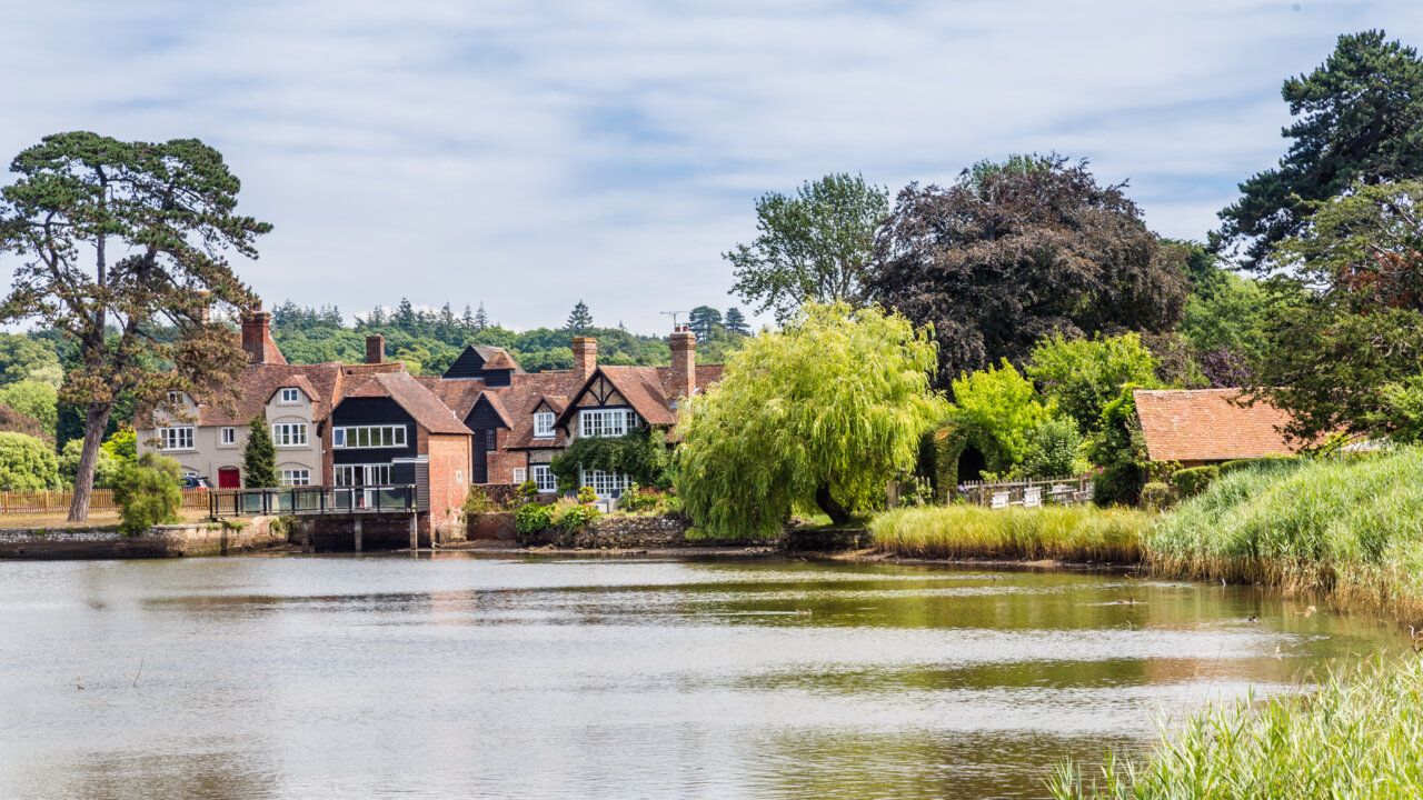 big cottages by river