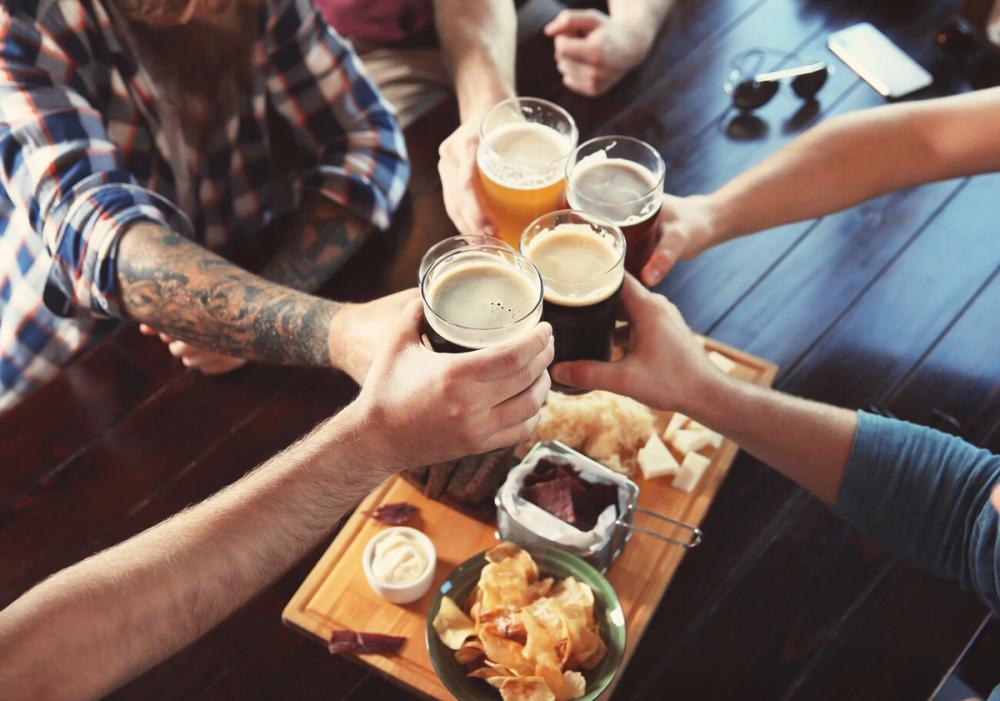 Cheers with pints