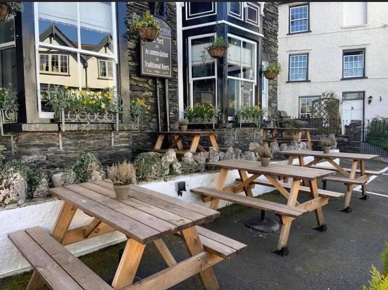The outdoor seating at The Royal Oak Inn, a dog-friendly pub in the Lake District