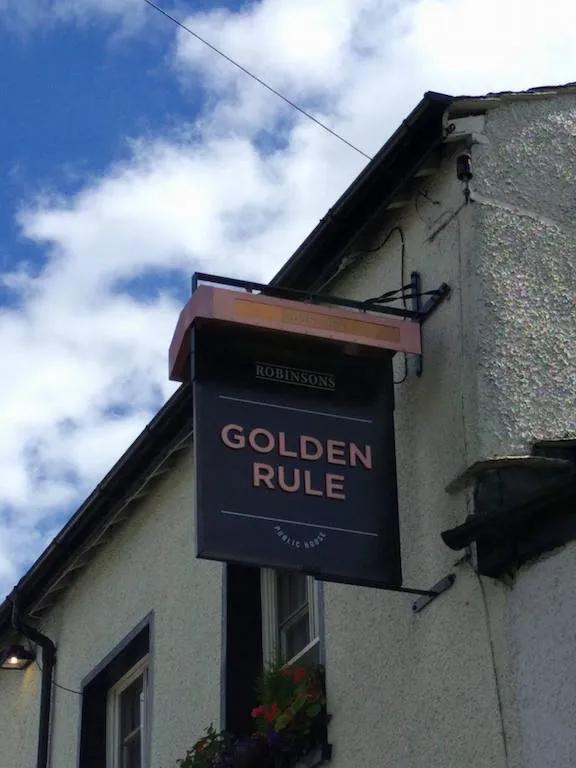 The sign outside The Golden Rule, a dog-friendly pub in the Lake District