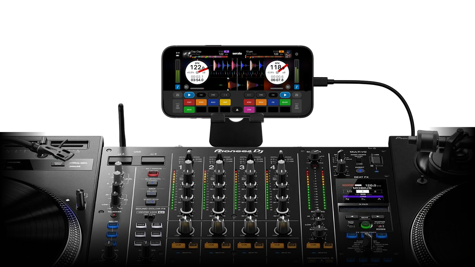 Serato DJ for iOS running on an iPhone connected via DVS  with turntables and a DJ mixer.