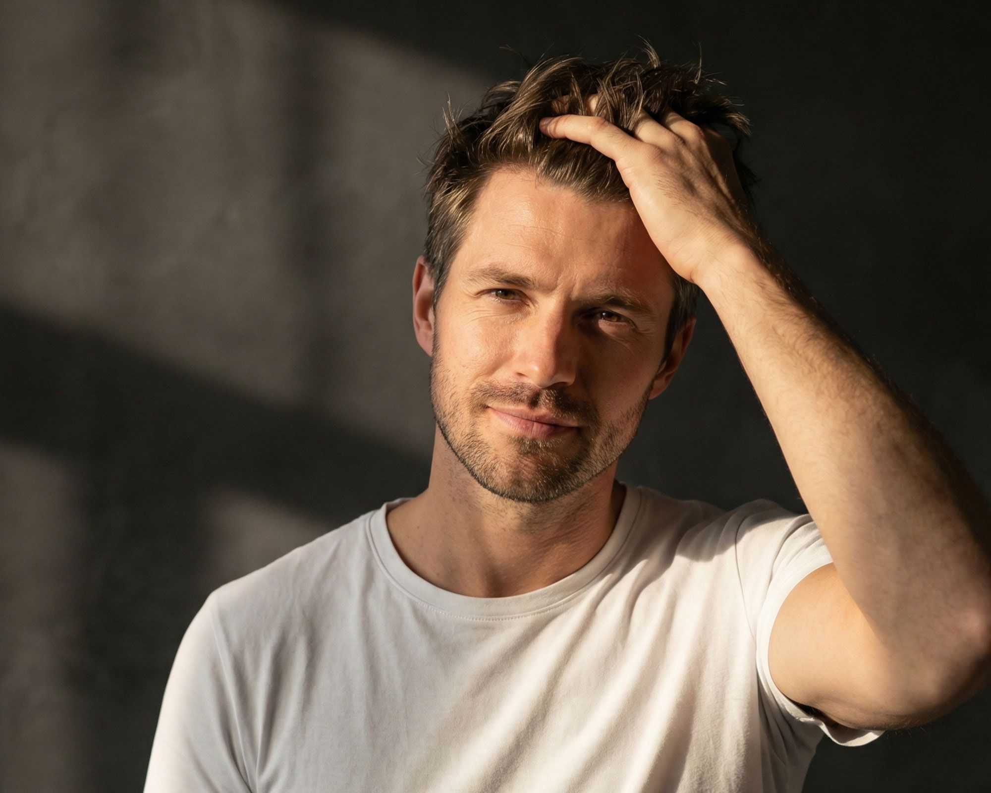 Man pulling his hair