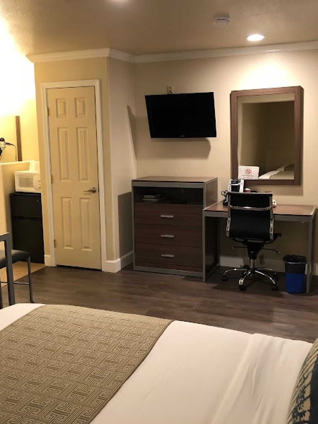Photo of El Castell Motel - Room, King Bed, Flat TV, Table & 2 Chairs, Work Desk, Fridge, Microwave, Coffee Machine