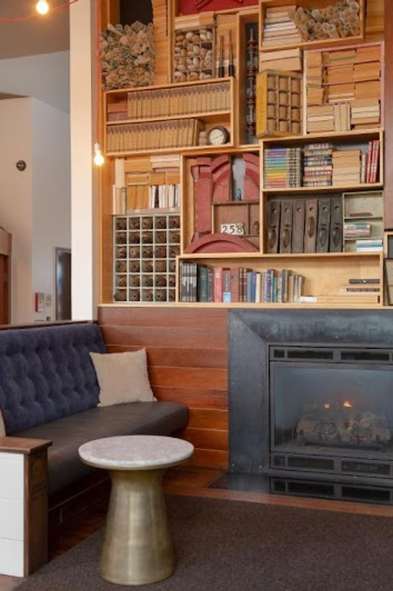 Photo of Commodore Hotel - Lobby, Seating area, Fireplace, Reception