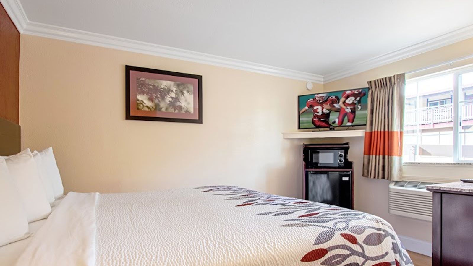 Photo of Red Roof Inn & Suites Monterey - Room, King Bed, Flat TV, Fridge, Microwave