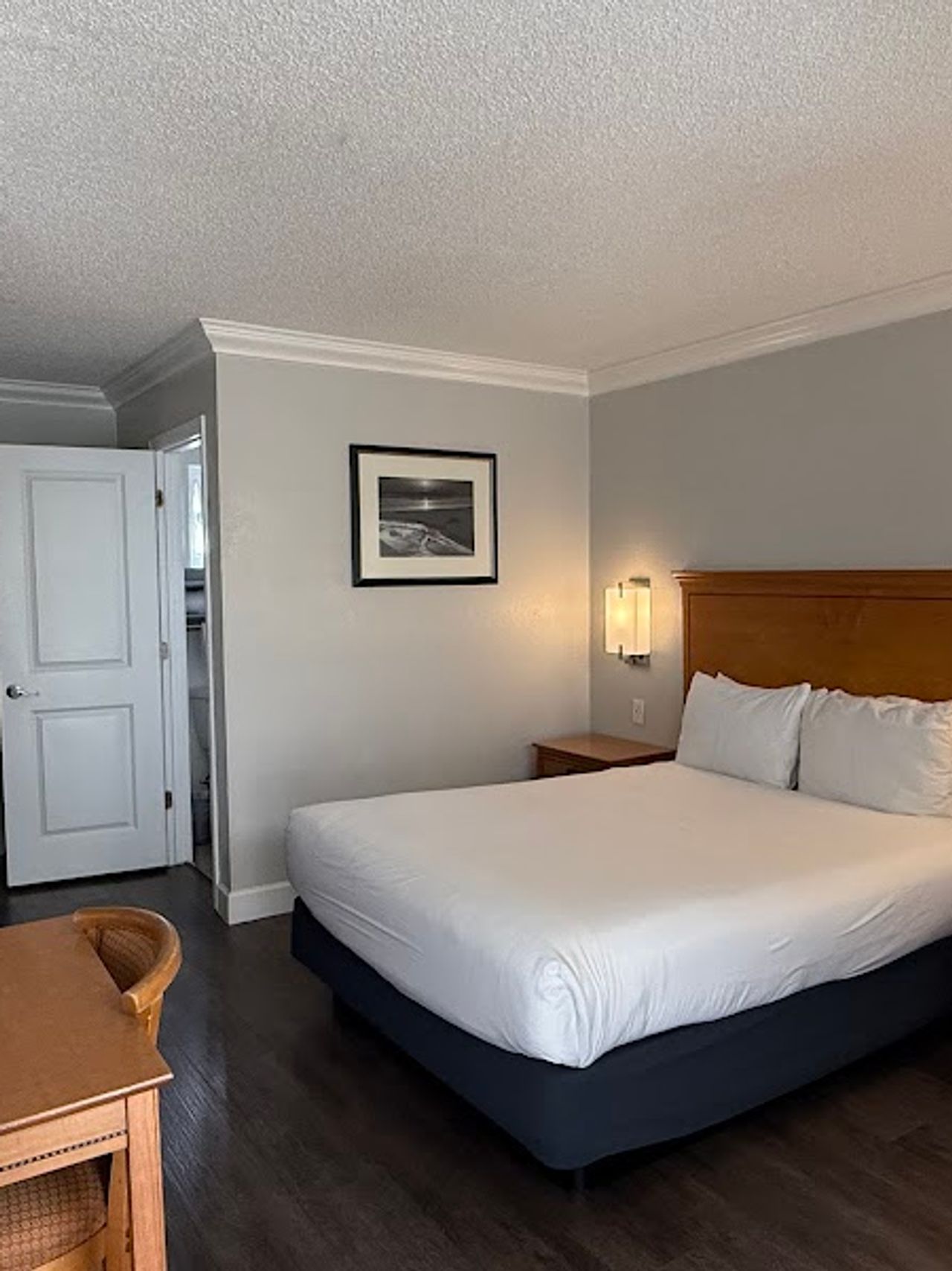 Photo of Stargazer Inn and Suites - Room, 1 Queen Bed, Flat TV, Work desk, Fridge, Microwave, Coffee machine