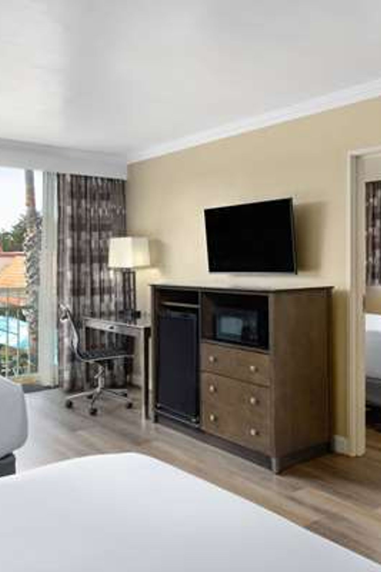 Photo of Travelodge by Wyndham Monterey Bay - Suite, 3 Queen Beds, Private Balcony, Flat TV, Work Desk, Fridge, Microwave, Coffee/Tea Maker