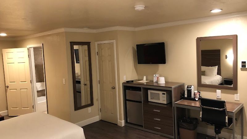 Photo of El Castell Motel - Room, 2 Queen Beds, Work Desk, Flat TV, Fridge, Microwave, Coffee Machine