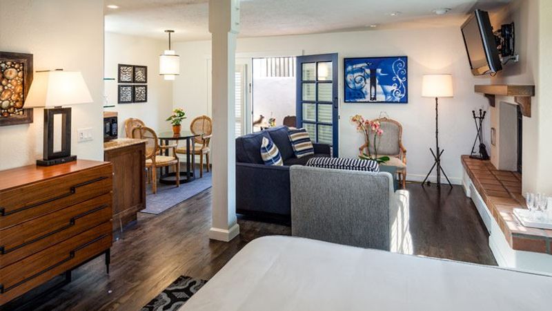 Photo of Hotel Pacific - Accessible Luxury Jr Suite King Bed, Separate seating area, Fireplace, Dining table