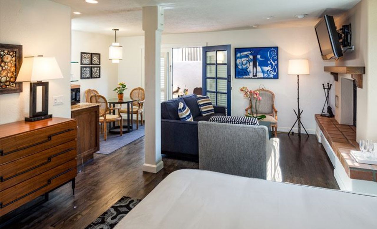 Photo of Hotel Pacific - Accessible Luxury Jr Suite King Bed, Separate seating area, Fireplace, Dining table