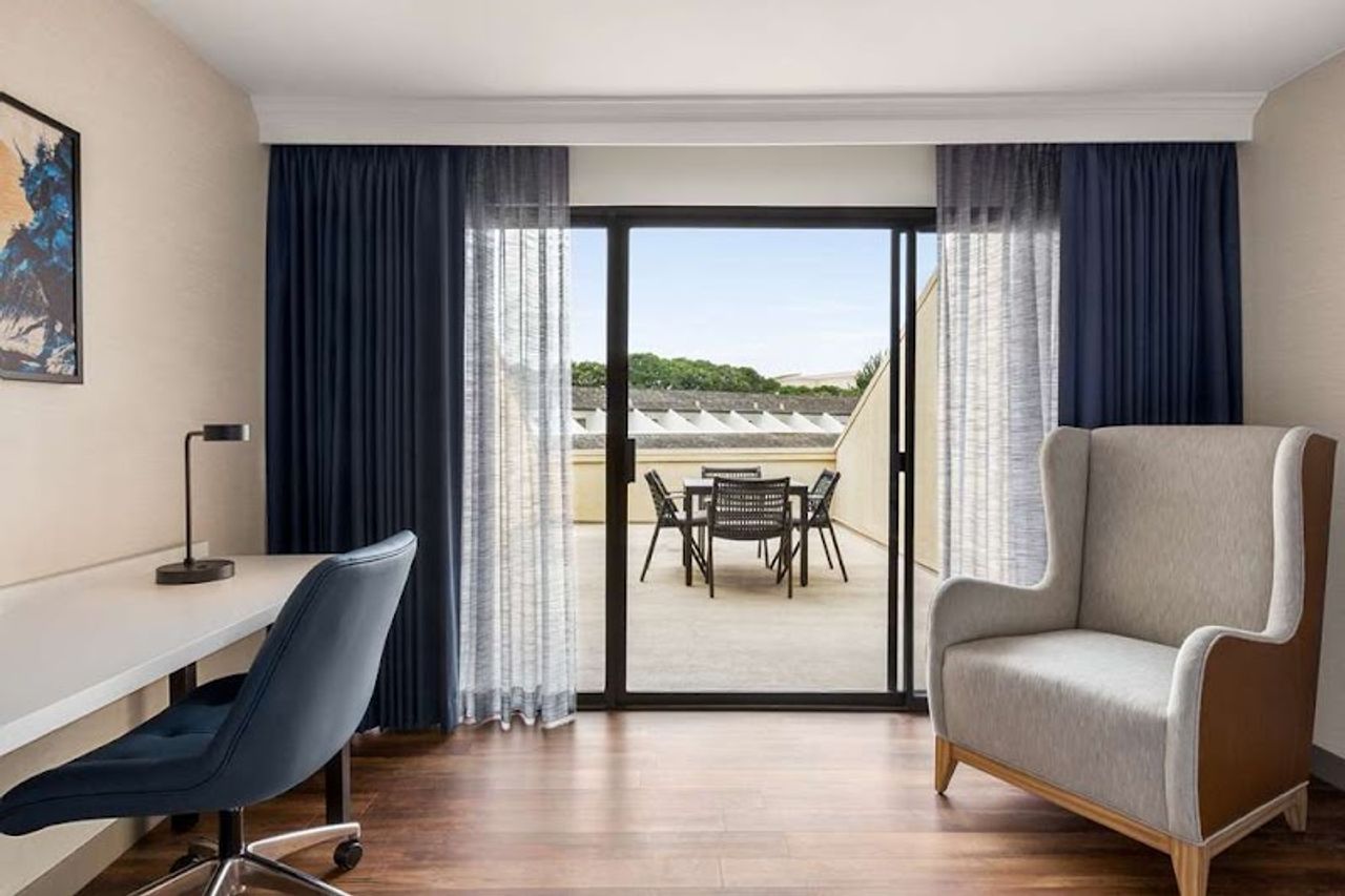 Photo of Hilton Garden Inn Monterey - Suite, Living room, Private Balcony