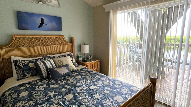 Photo of Village West Marina & Resort - "Riverside" Bungalow - Bedroom, Queen bed