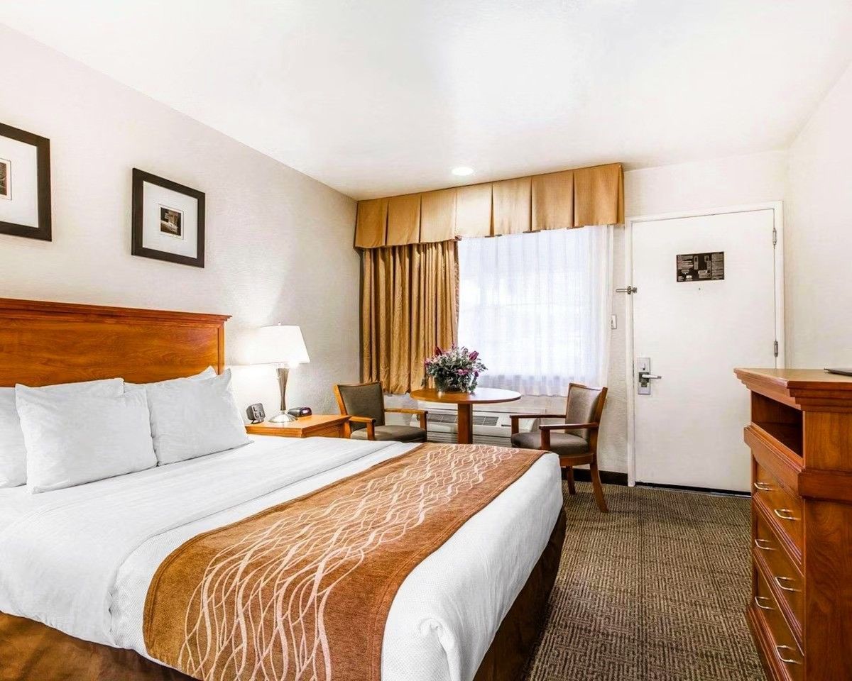 Photo of The Inn at 1252 Monterey - King Bed Room, table and chairs