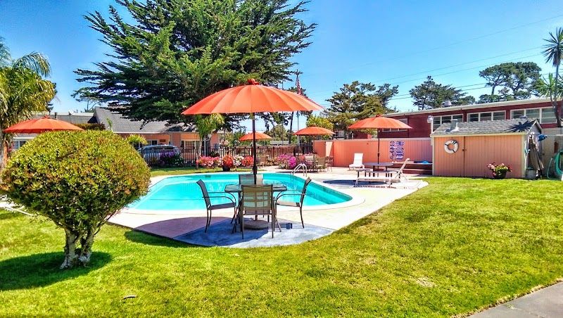 Photo of Butterfly Grove Inn - Outdoor pool, hot tub, seating area