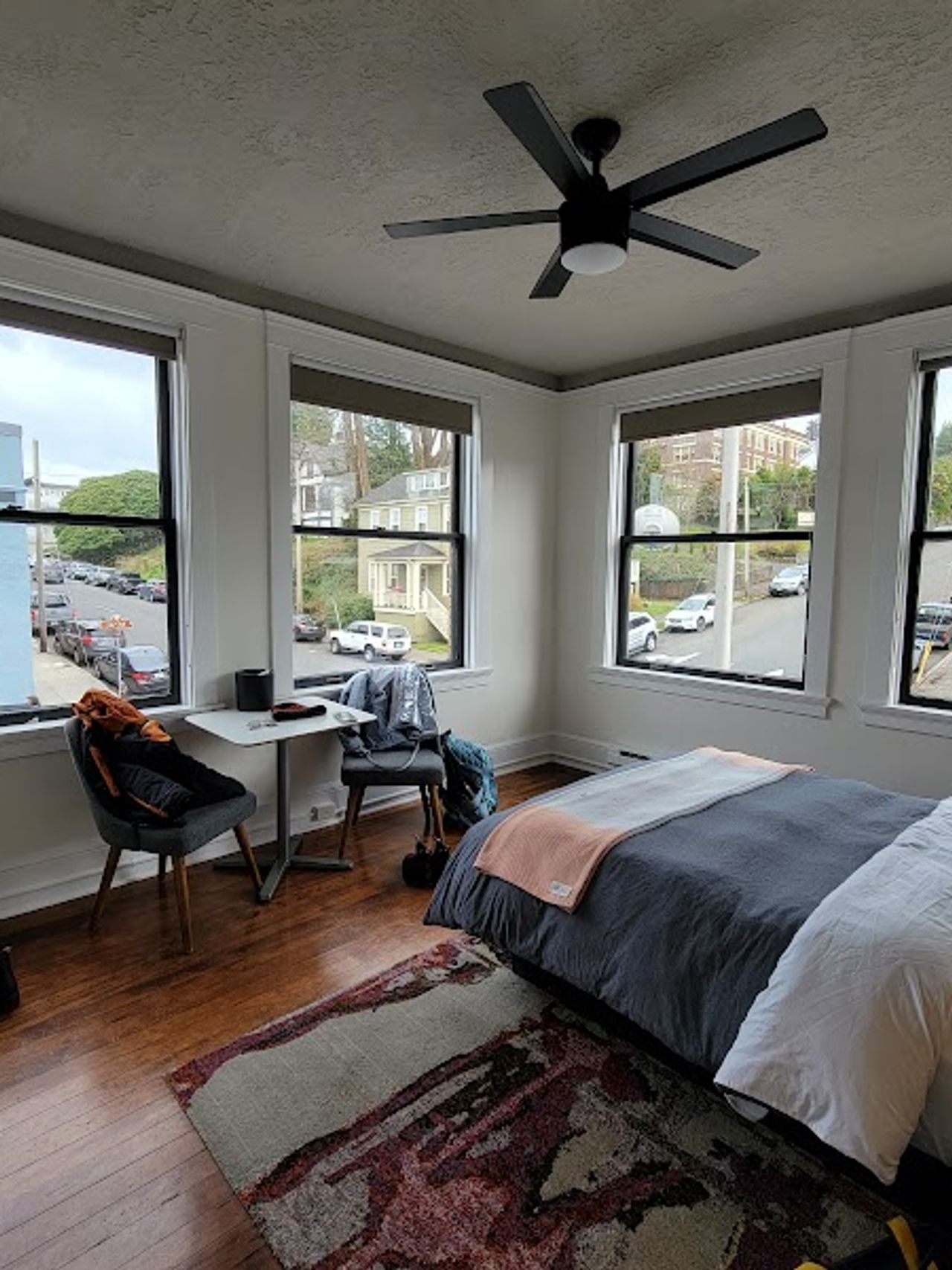 Photo of Norblad Hotel - Cabin Room, a queen bed, pillow-top mattress, an apron sink - with fresh towels, a table and chairs, and complimentary WiFi