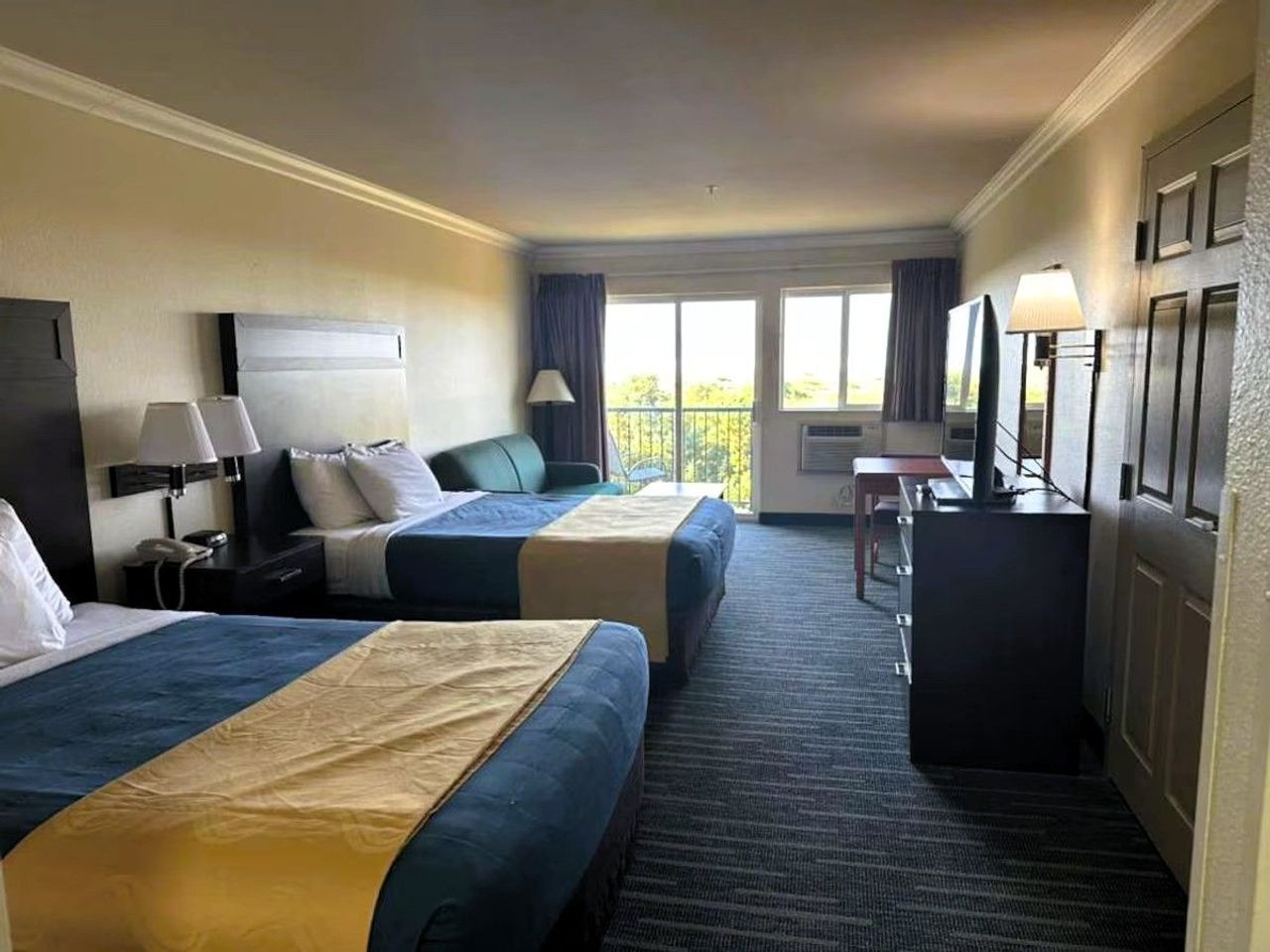 Photo of Ocean Paradise Hotel & Resort - Room, 2 queen beds, private balcony, flat tv, seating area