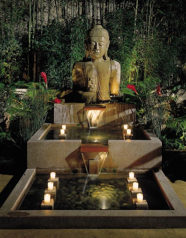 Photo of Tradewinds Carmel - Courtyard with cascading fountain