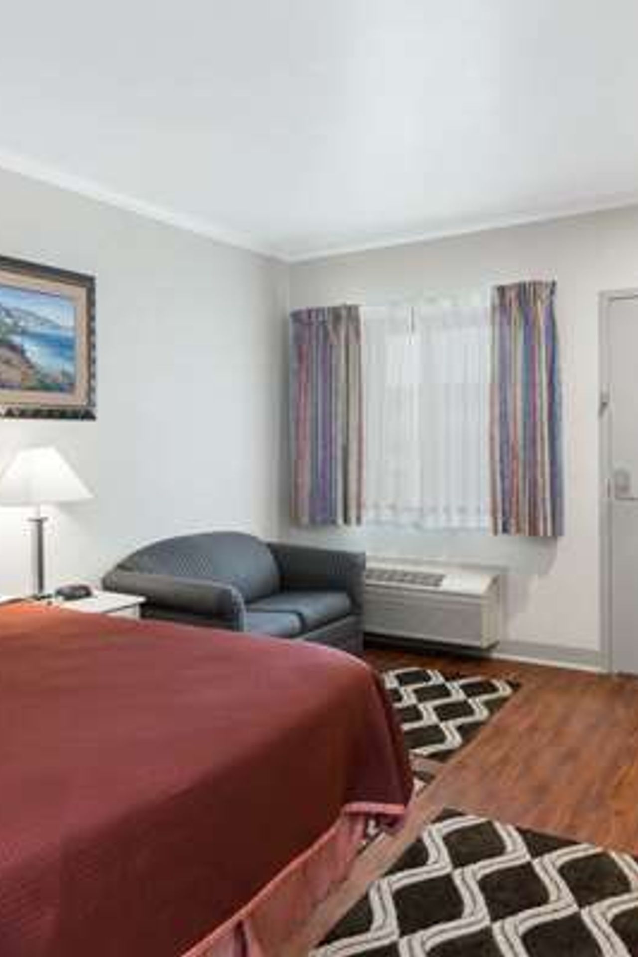 Photo of Monarch Valley Inn Marina at Monterey Bay - Room, King Bed, Sofa, Work desc