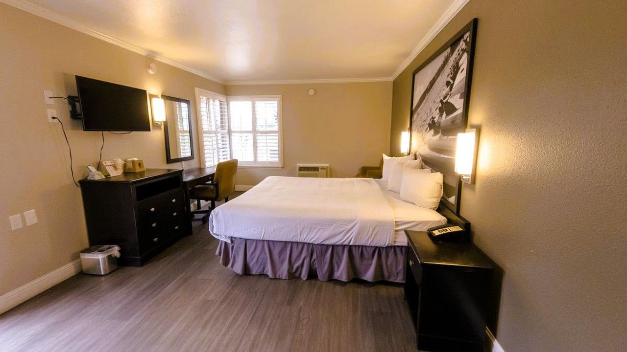 Photo of Super 8 by Wyndham Santa Cruz Beach Boardwalk - Room, King Bed