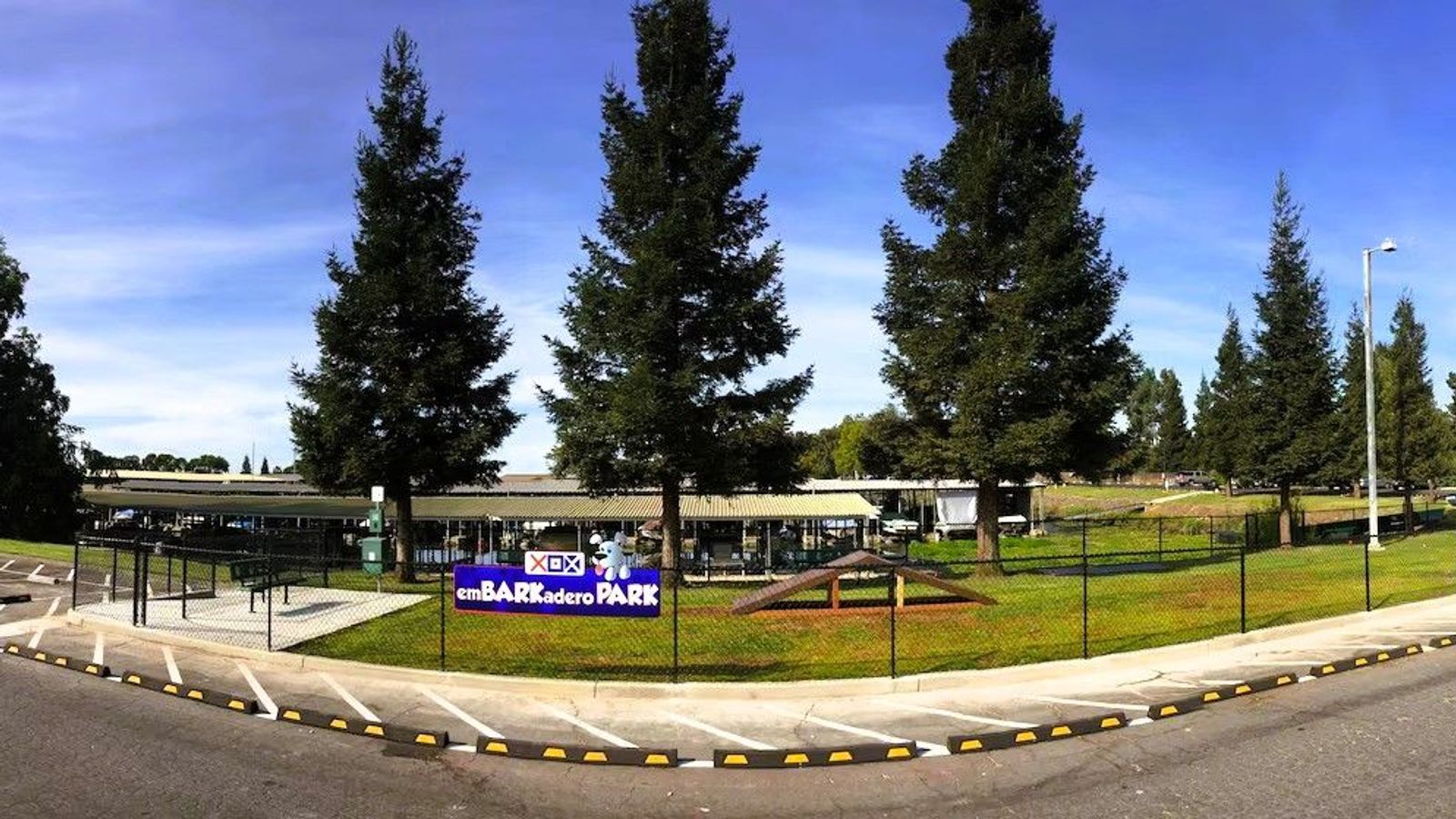 Photo of Village West Marina & Resort - emBARKadero Park, a fenced dog park with agility features