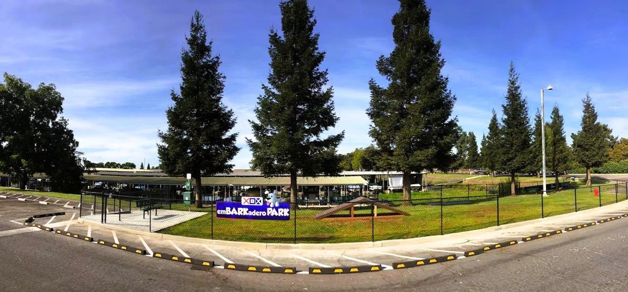 Photo of Village West Marina & Resort - emBARKadero Park, a fenced dog park with agility features