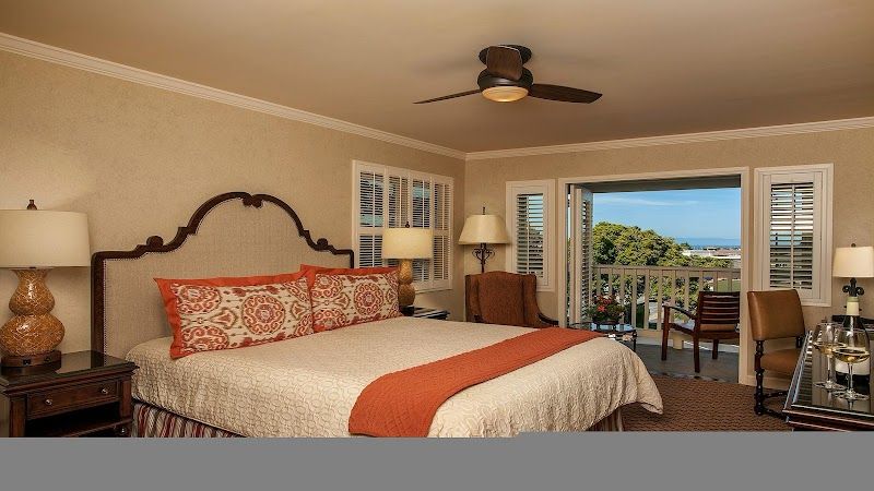 Photo of Casa Munras Garden Hotel & Spa - Deluxe King Guest Room, Fireplace, Private Balcony, 50" Flat TV, Keurig coffee maker, work desk
