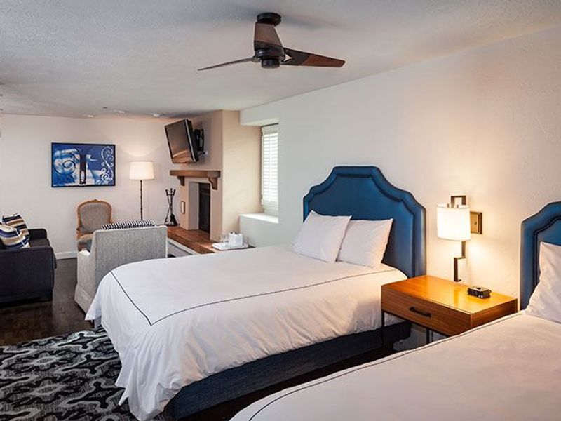 Photo of Hotel Pacific - Standard Junior Suite 2 Doubles, 2 queen beds, Separate seating area, Fireplace