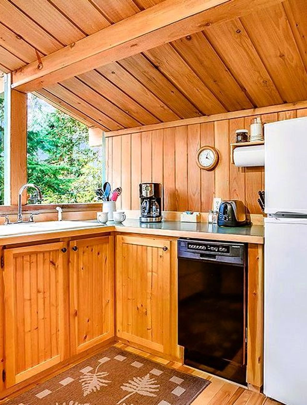 Photo of Deep Forest Cabins - Maplewild Cabin, kitchen with stove, refrigerator, dishwasher, microwave