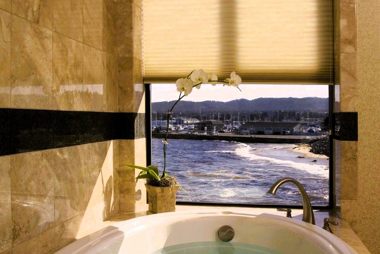 Photo of Monterey Bay Inn - Two-person jetted tub with ocean views