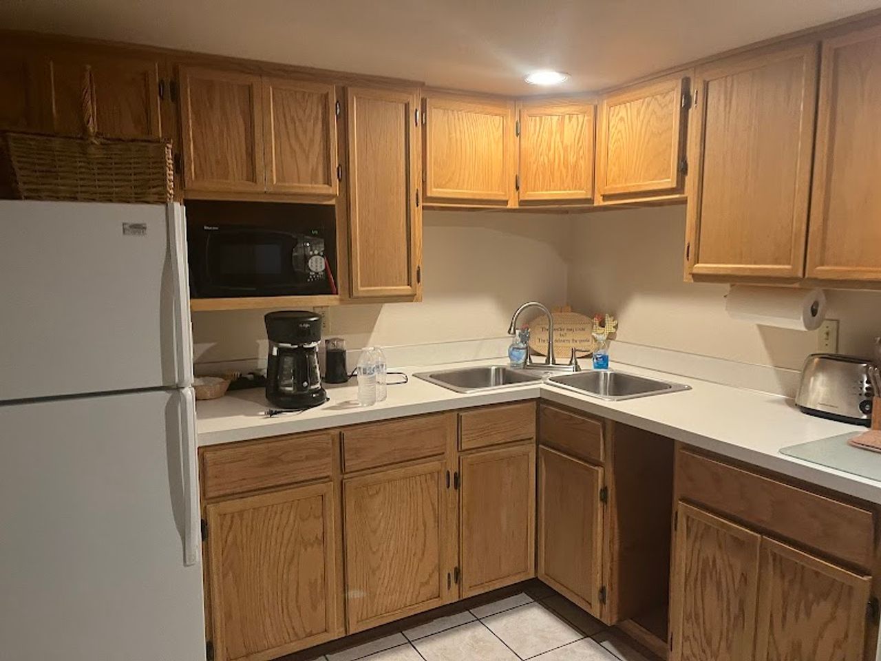 Photo of Almost Paradise Lodging at Mt. Rainier - Sunrise Guest House, Kitchen — well equipped with microwave, refrigerator, range, coffee maker/grinder, toaster, dishes, utensils, pots, coffee beans, tea