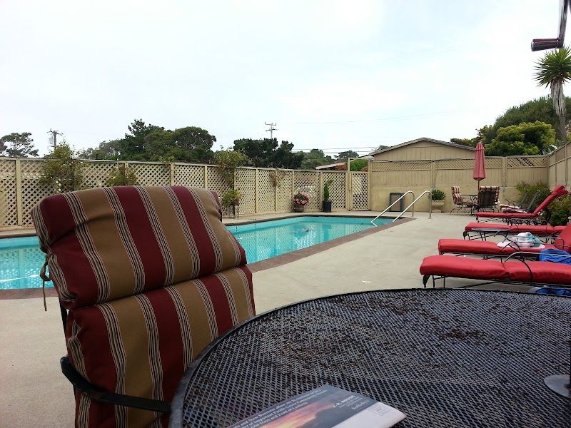 Photo of Monterey Peninsula Inn - Outdoor Pool, Seating area, Sun lounges