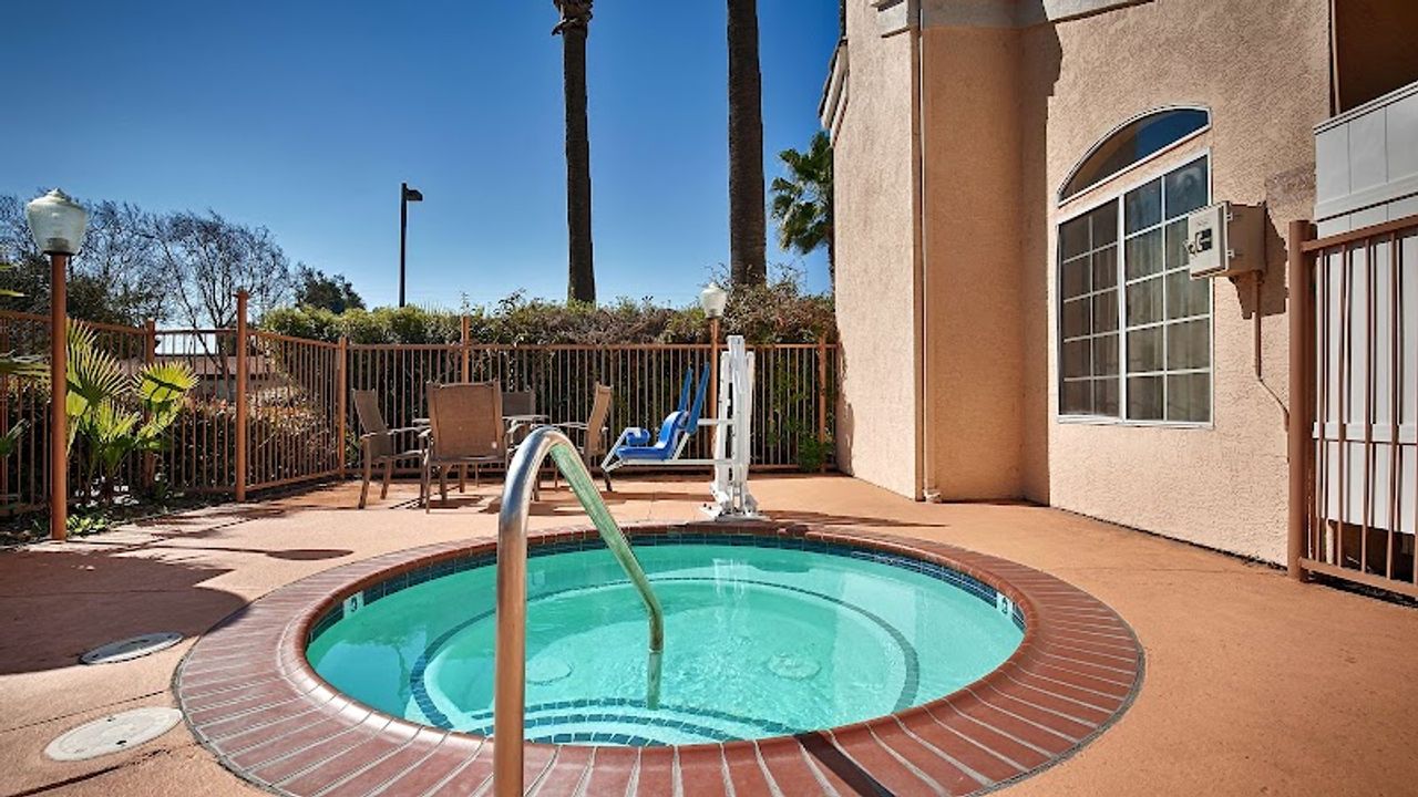 Photo of Best Western Palm Court Inn - Outdoor pool and Hot Tub