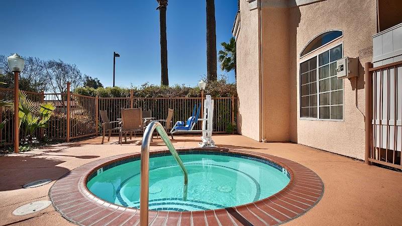 Photo of Best Western Palm Court Inn - Outdoor pool and Hot Tub