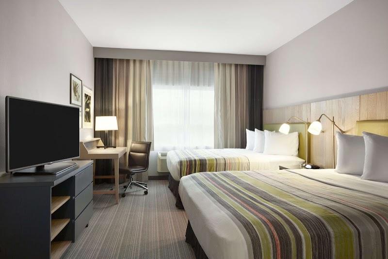 Photo of Country Inn & Suites by Radisson, Monterey Beachfront-Marina, CA - Room, 2 Queen Beds, Work desk