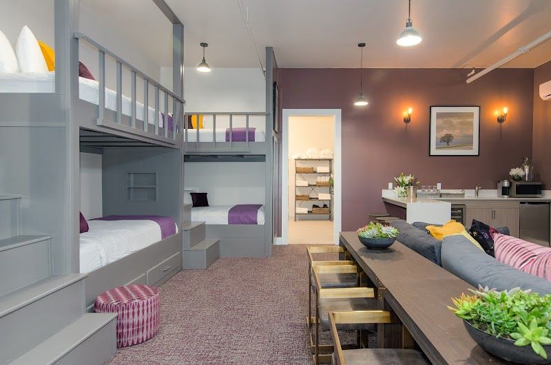 Photo of The Dundee Hotel - Squad Room (For Six), Luxury shower, TV, great sofa, bookcase, and games, Kitchen