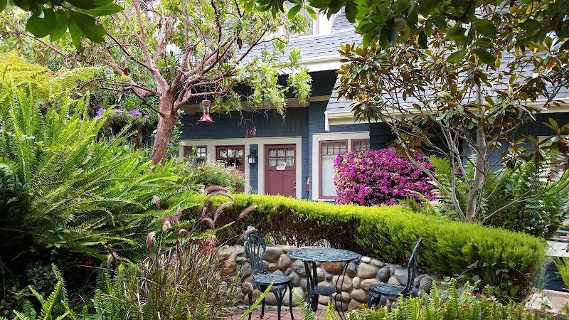 Photo of The Old St. Angela Inn - Front yard fountain and outdoor seating