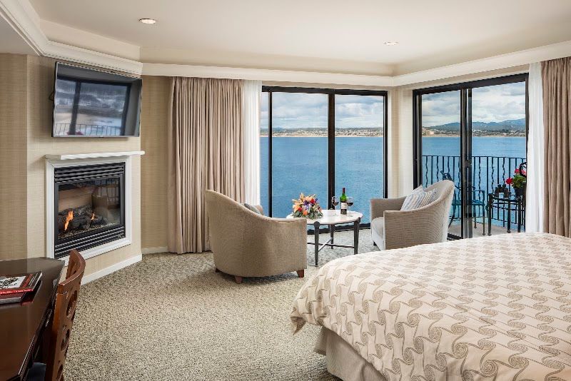 Photo of Monterey Bay Inn - Panoramic Oceanfront Room, king-size bed with a luxury euro-top, gas fireplace, 47" HDTV, a two-person jetted tub with ocean views and a separate shower
