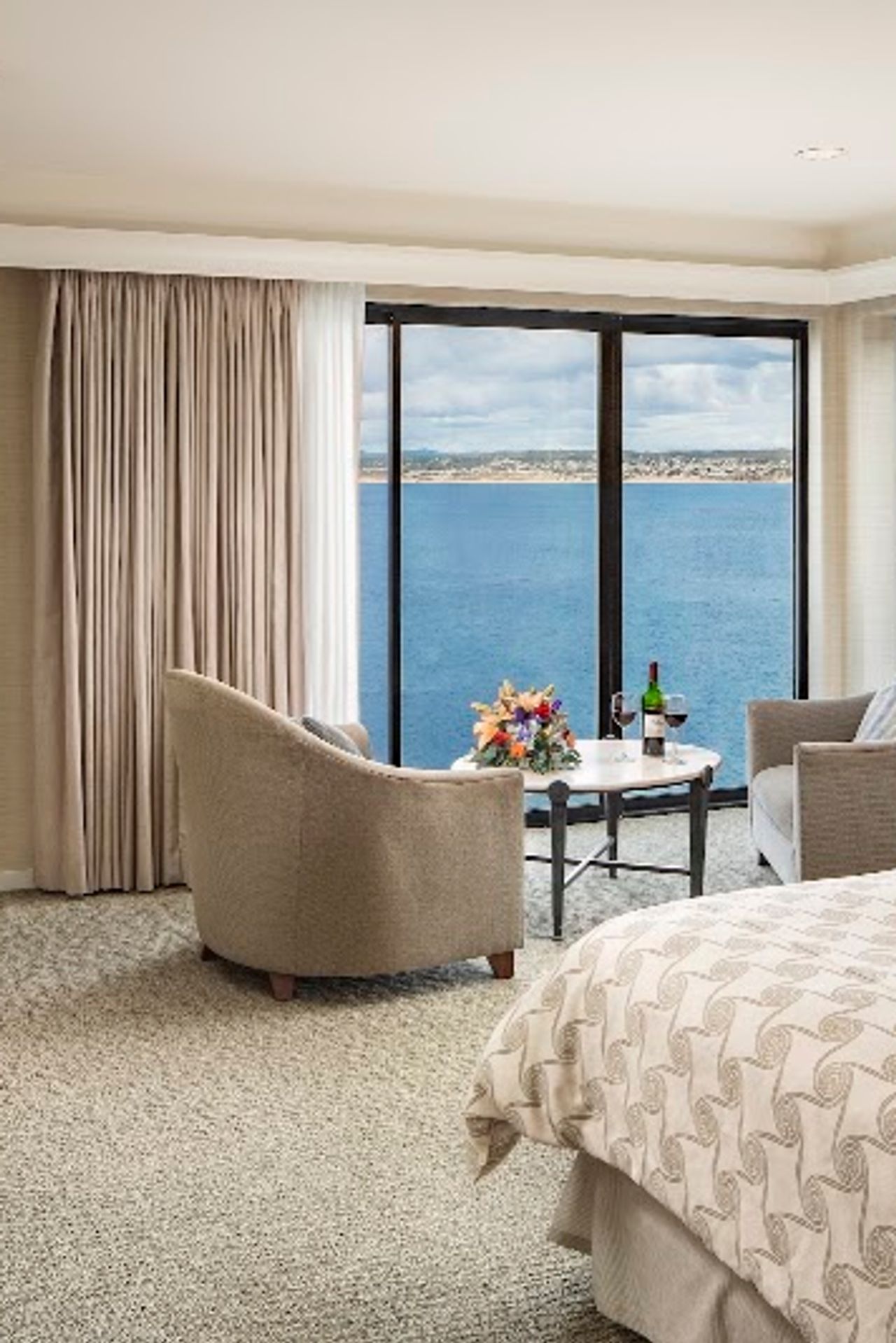 Photo of Monterey Bay Inn - Panoramic Oceanfront Room, king-size bed with a luxury euro-top, gas fireplace, 47" HDTV, a two-person jetted tub with ocean views and a separate shower