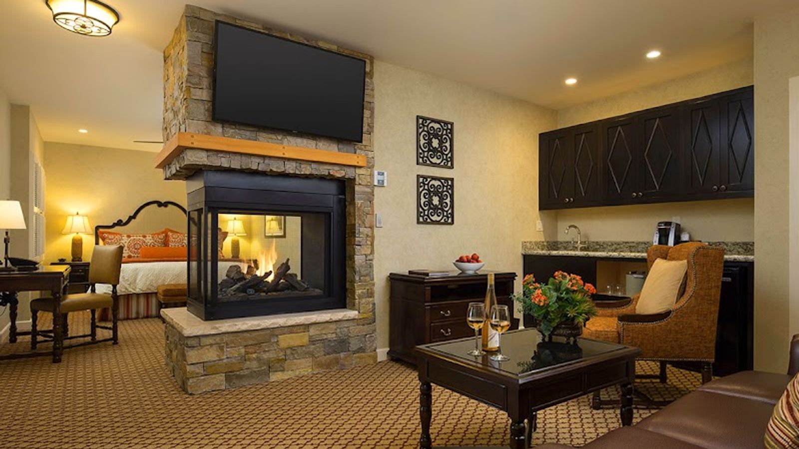 Photo of Casa Munras Garden Hotel & Spa - Junior Suite With Sofa Bed, Fireplace, Separate Living area, 2 55" Flat TVs, large bathroom with a walk-in shower, separate tub, and double vanity