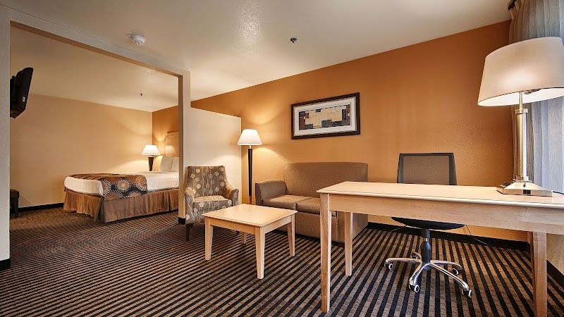 Photo of Best Western Palm Court Inn - Suite, King Bed, Living and Working Area