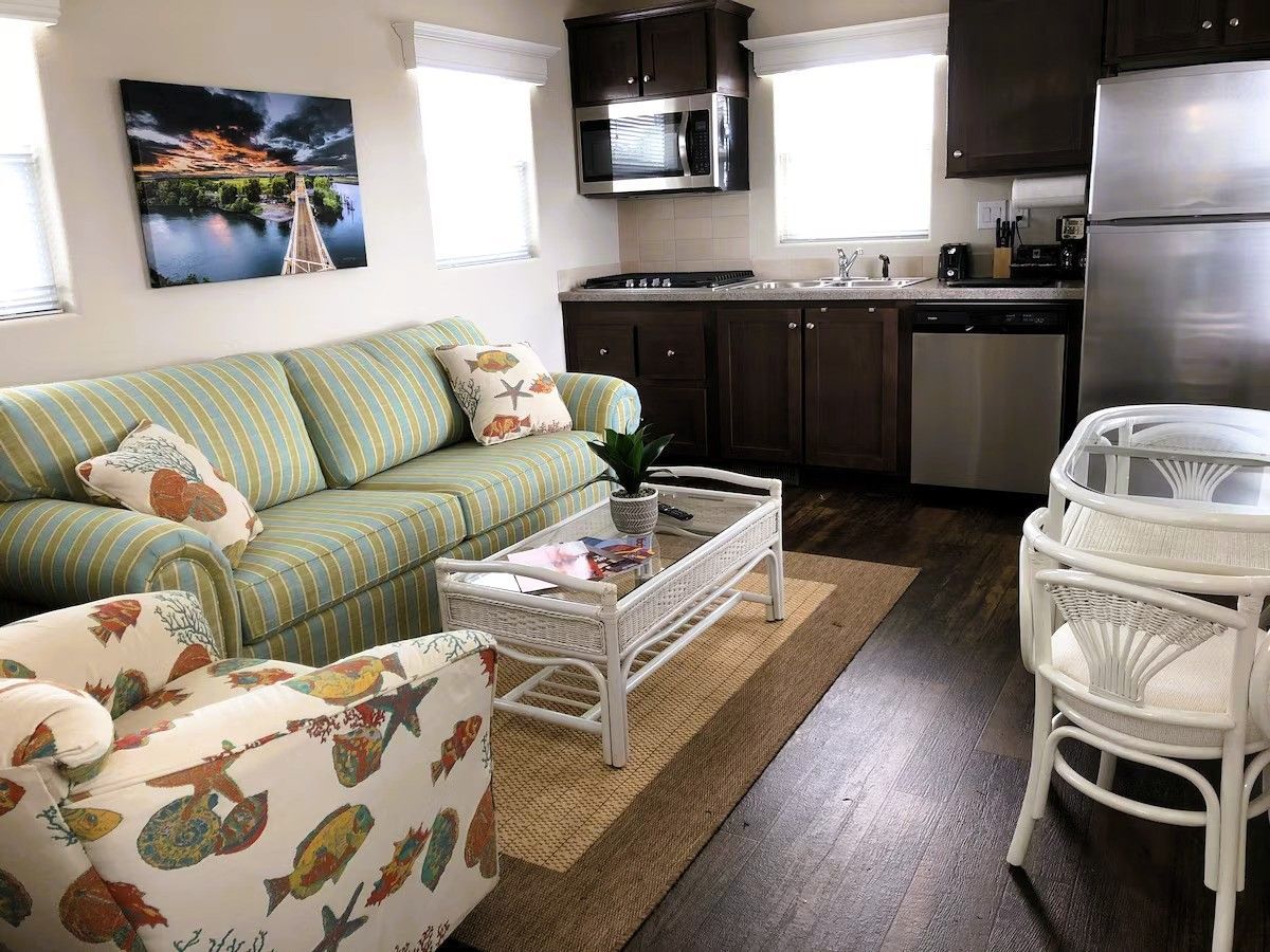 Photo of Village West Marina & Resort - "Delta" Bungalow - Living area, Full kitchen, Microwave, Fridge, Dining table