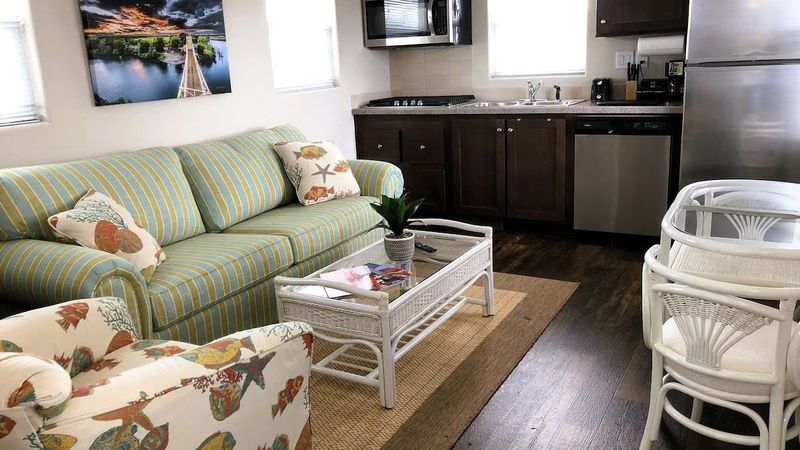 Photo of Village West Marina & Resort - "Delta" Bungalow - Living area, Full kitchen, Microwave, Fridge, Dining table