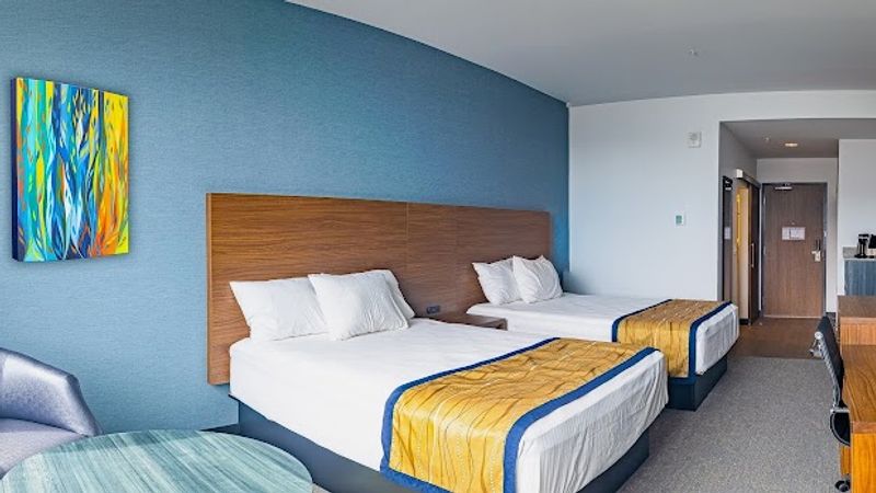 Photo of Hayward Inn - Room, 2 Queen Beds, Seating area, Flat TV