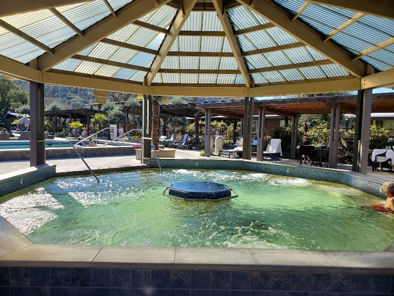 Photo of Calistoga Spa Hot Springs - Adults-only Jet Pool with Jacuzzi jets beneath a covered pavilion