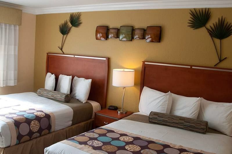 Photo of Deer Haven Inn - Room with 2 Queen Beds & Fireplace