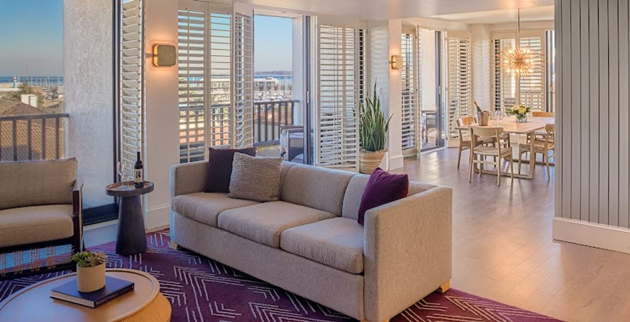 Photo of Portola Hotel & Spa at Monterey Bay - Presidential Suite, two living spa, five balconies, dining area, Two Full Bathrooms, Large Soaking Tub