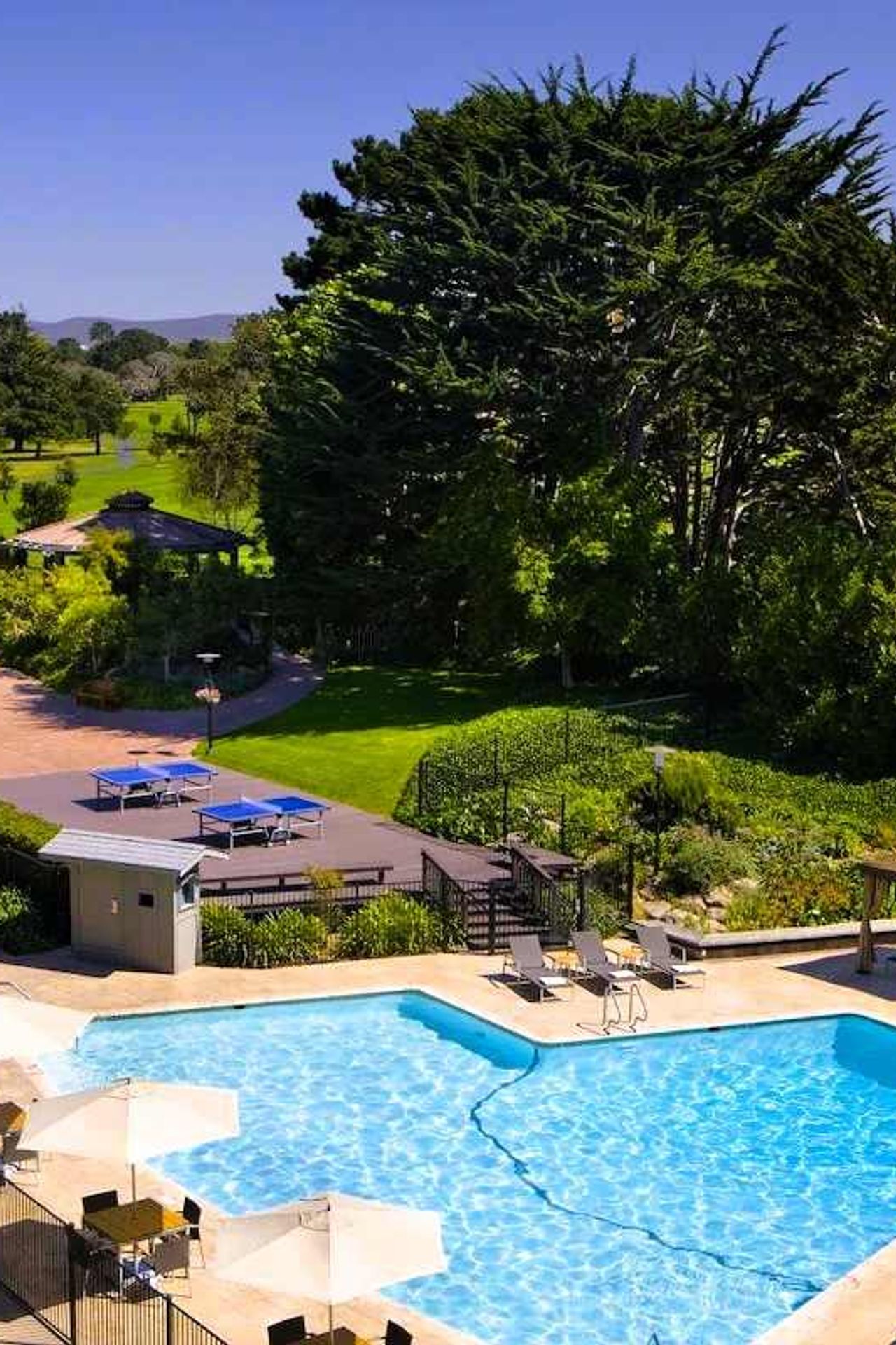Photo of Hyatt Regency Monterey Hotel and Spa on Del Monte Golf Course - Outdoor pools, hot tub, sun loungers, table tennis boards