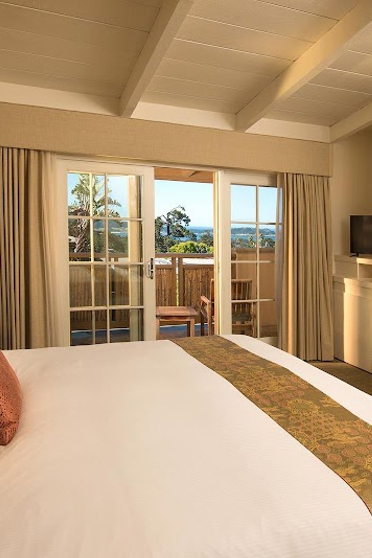 Photo of Tradewinds Carmel - Serenity Suite, King bed, fireplace, a spa-jetted tub